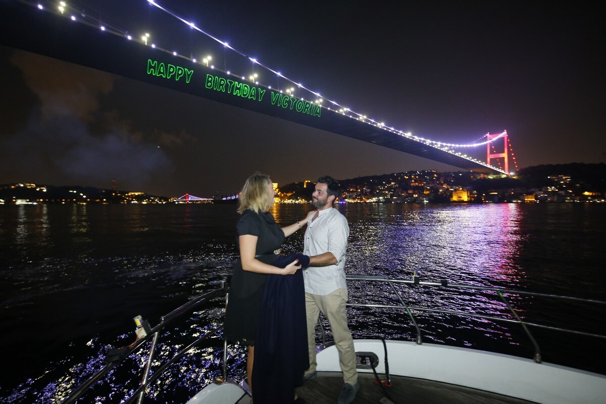 Writing Happy Birhday on the Bosphorus Bridge with Laser